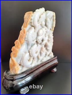 A large Chinese exceptional light celadon or white jade sculpture, 3. 8 lb